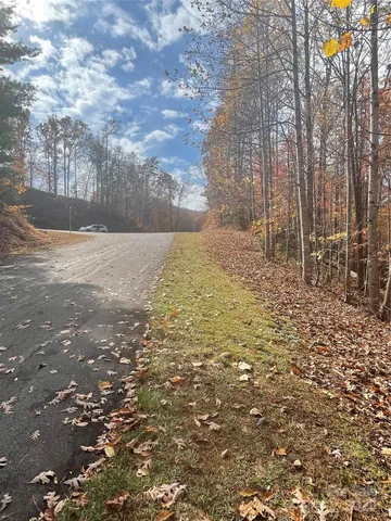 a view of a patio with table and chairs with wooden floor