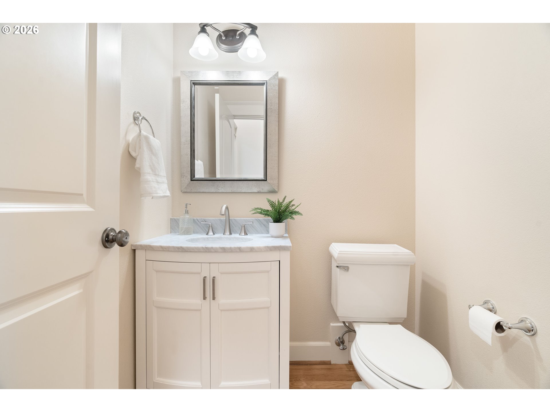 3578 Northwest Gerritz Terrace Portland, OR 97229 - Photo 21 of 47 a bathroom with a toilet a sink and mirror