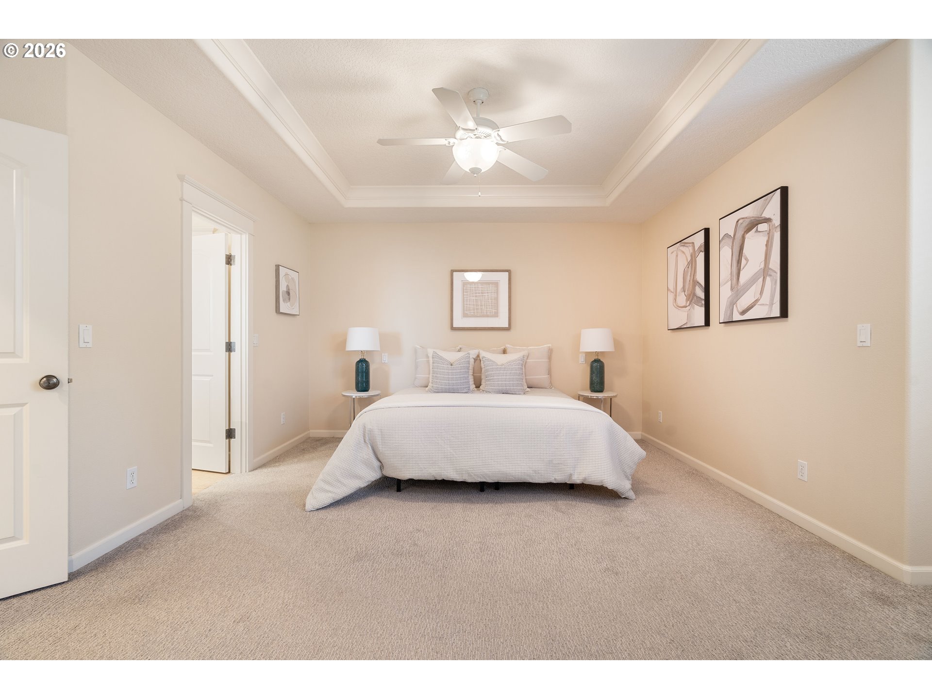 3578 Northwest Gerritz Terrace Portland, OR 97229 - Photo 25 of 47 a bedroom with a large bed and a chandelier