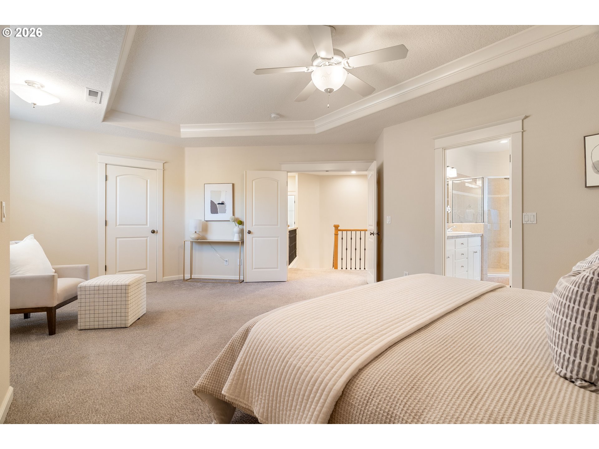 3578 Northwest Gerritz Terrace Portland, OR 97229 - Photo 27 of 47 a bedroom with a large bed and ceiling fan
