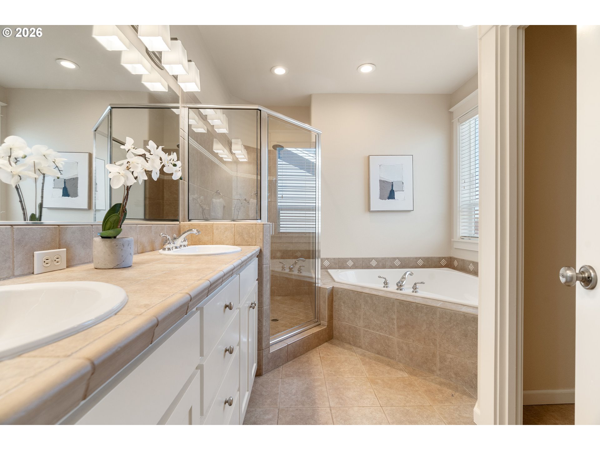 3578 Northwest Gerritz Terrace Portland, OR 97229 - Photo 29 of 47 a bathroom with a granite countertop sink a large mirror and a bathtub