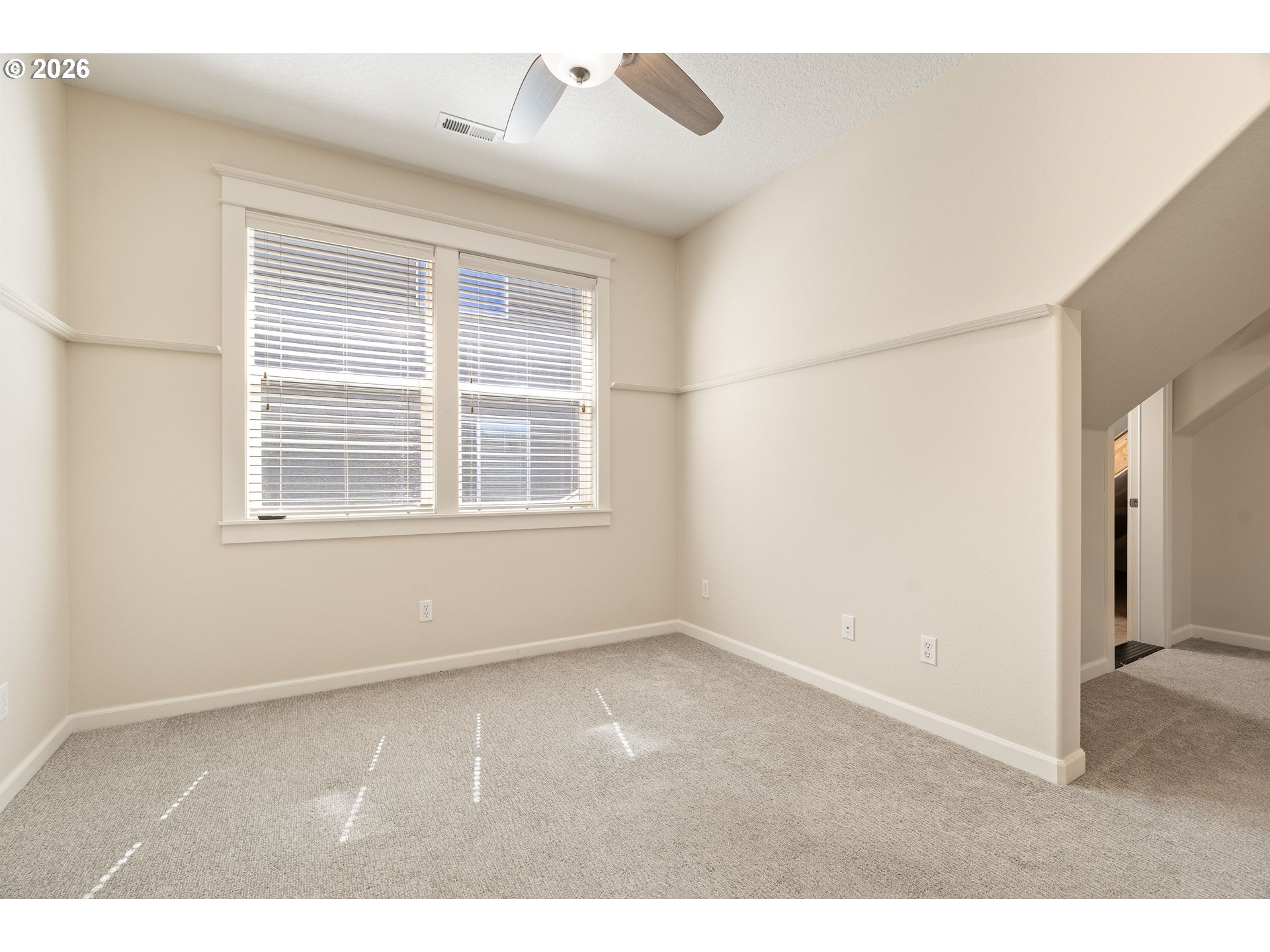 3578 Northwest Gerritz Terrace Portland, OR 97229 - Photo 35 of 47 a view of an empty room with a window