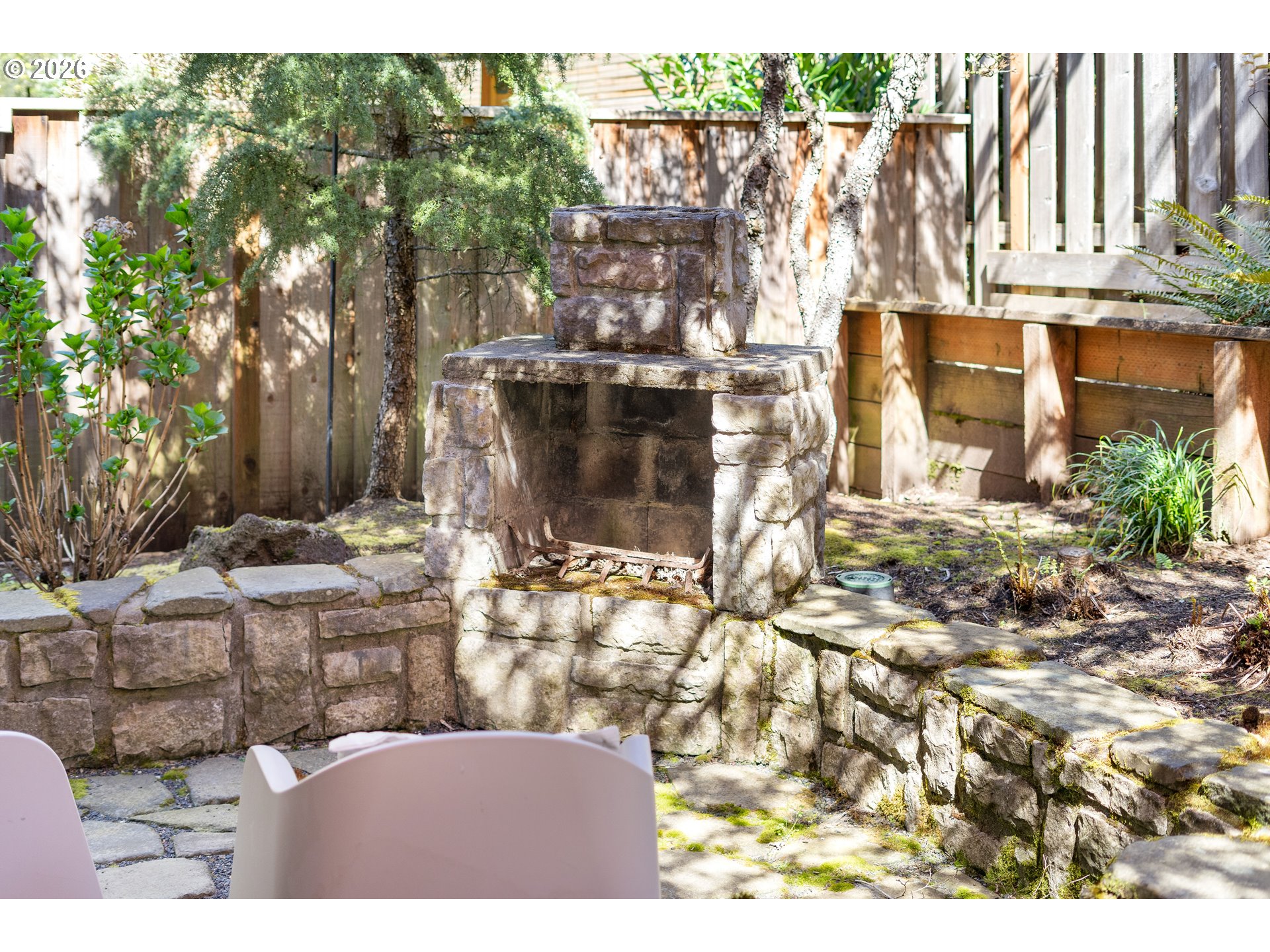 3578 Northwest Gerritz Terrace Portland, OR 97229 - Photo 46 of 47 a backyard of a house with yard and outdoor seating
