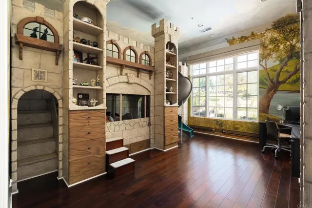 a view of livingroom with furniture and a window