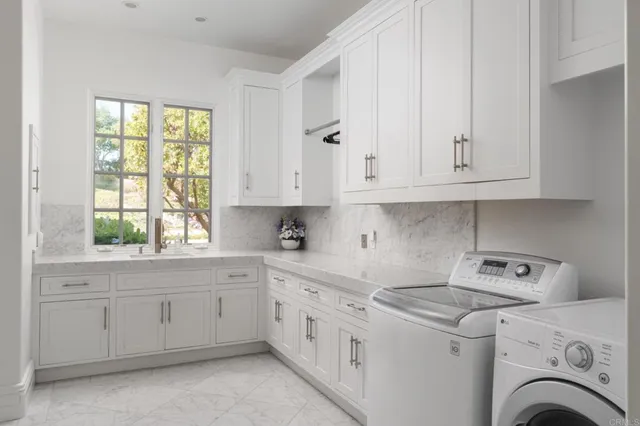 a view of a kitchen with appliances and cabinets