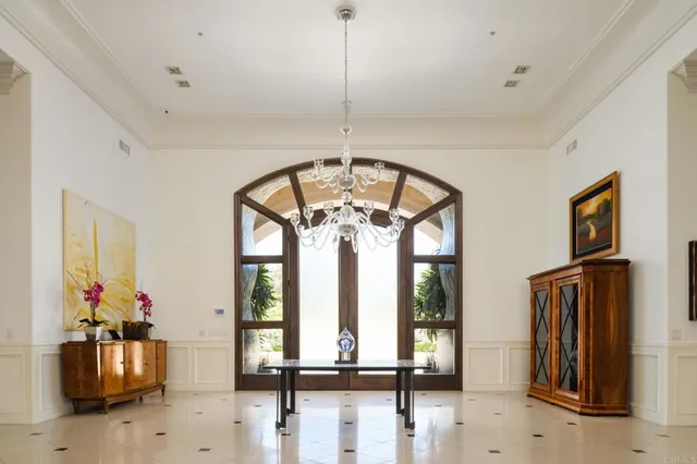 a living room with fireplace furniture and a flat screen tv