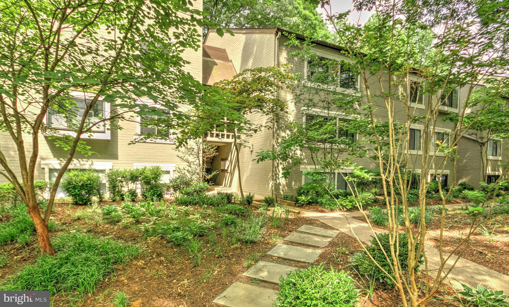 11727 Ledura Court, Unit 201 Reston, VA 20191 - Photo 2 of 29 a view of a pathway of a building