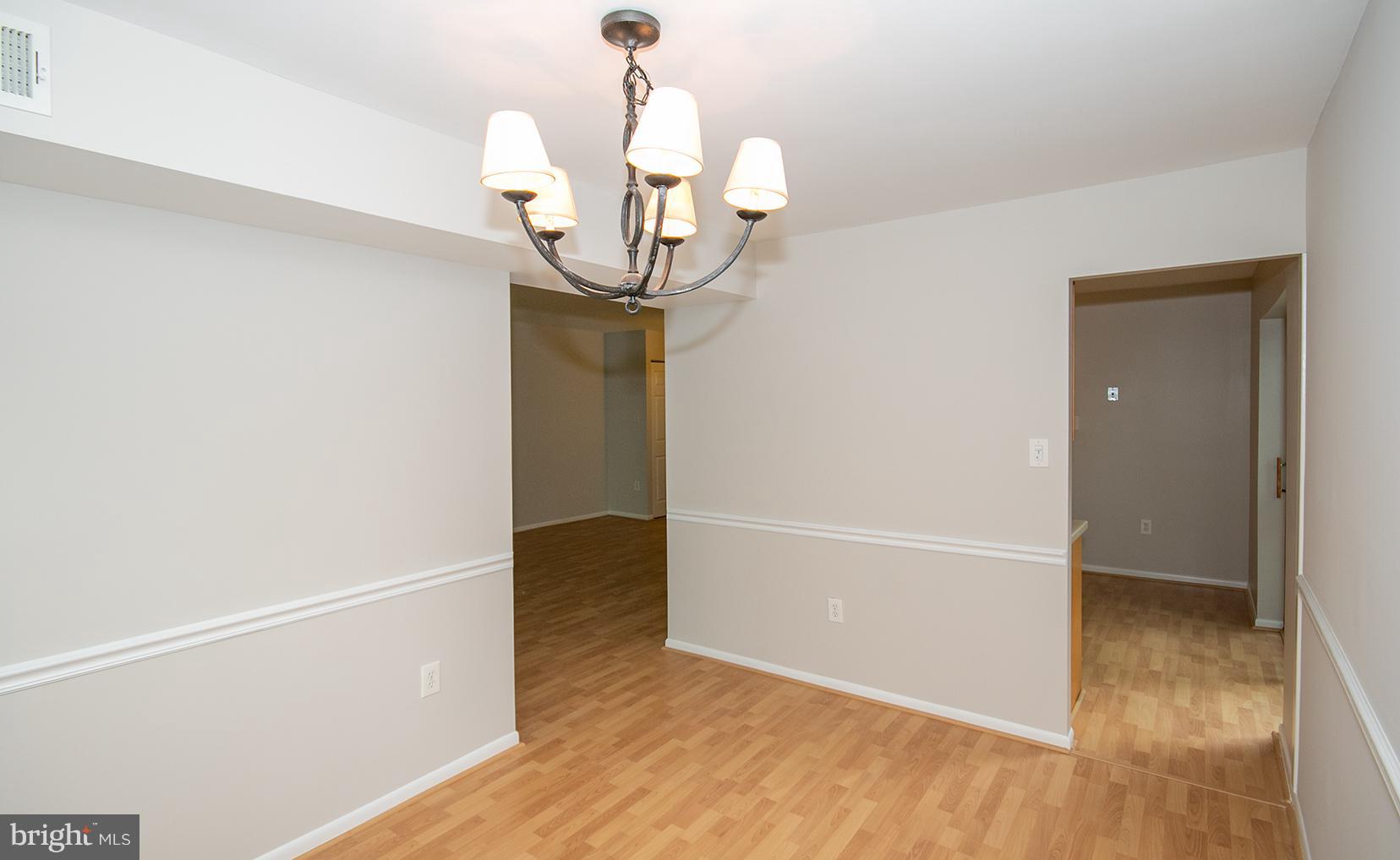 11727 Ledura Court, Unit 201 Reston, VA 20191 - Photo 12 of 29 a view of entryway with wooden floor