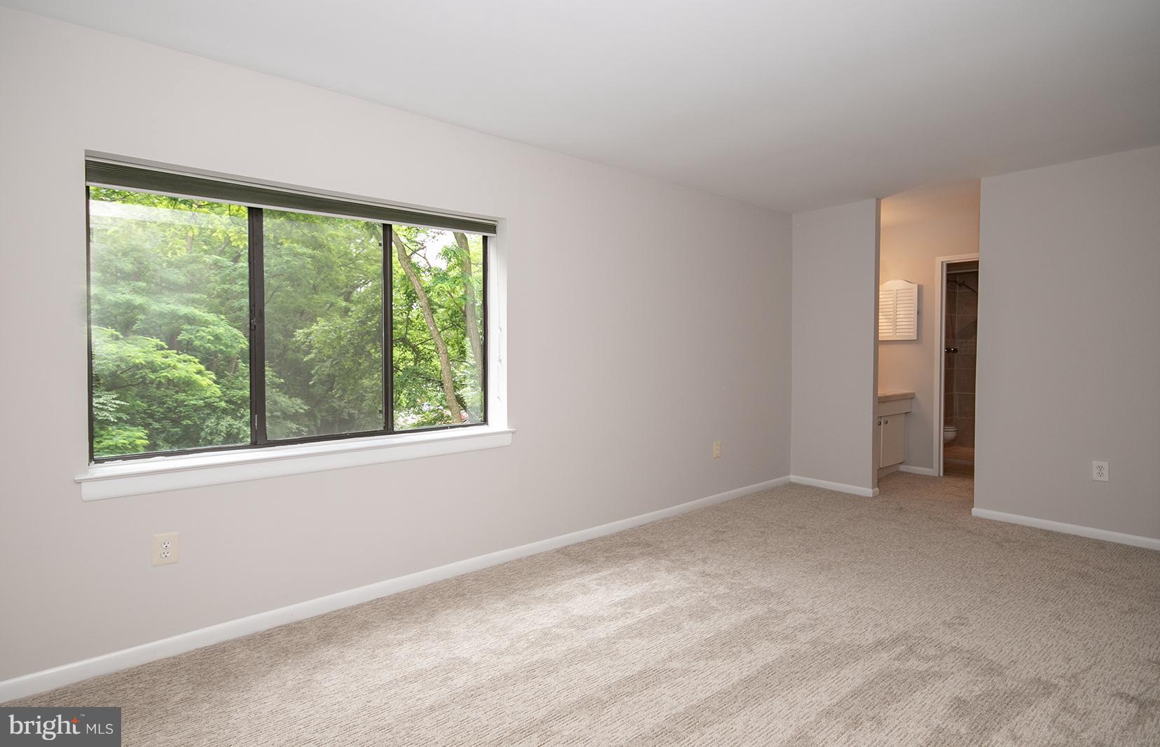 11727 Ledura Court, Unit 201 Reston, VA 20191 - Photo 18 of 29 an empty room with a window