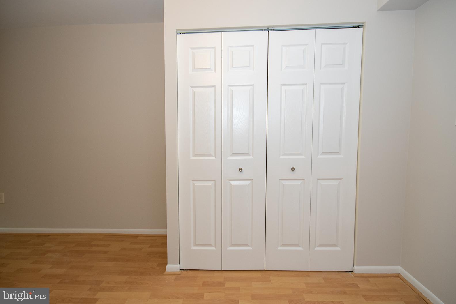 11727 Ledura Court, Unit 201 Reston, VA 20191 - Photo 4 of 29 a view of wooden door
