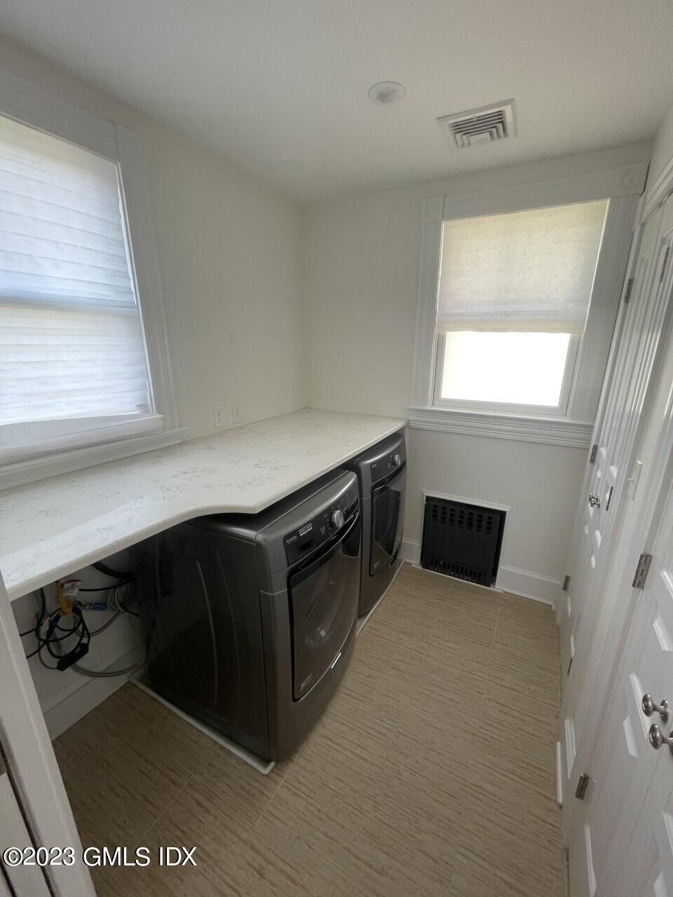 37 Orchard Street, Unit B Cos Cob, CT 06807 - Photo 9 of 15 a kitchen with a stove and a microwave