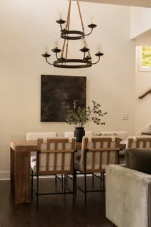 a living room with furniture fireplace and window