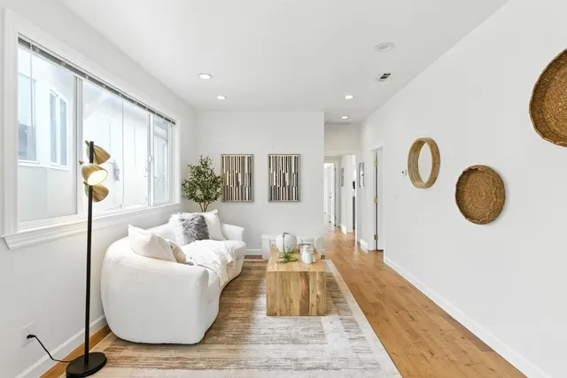 a kitchen with stainless steel appliances a stove a microwave and cabinets
