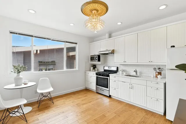 a backyard of a house with seating space