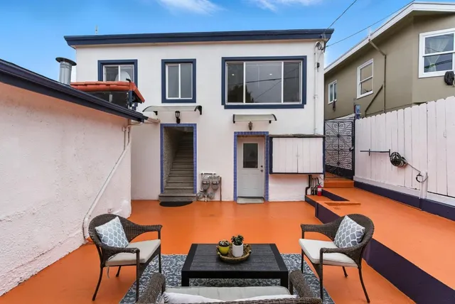 a view of storage and utility room with washer and dryer