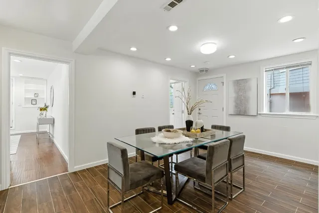 an aerial view of a house with a swimming pool