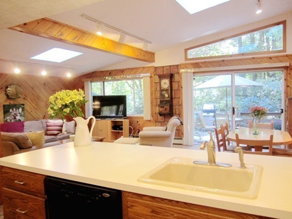 a view of a living room and dining room