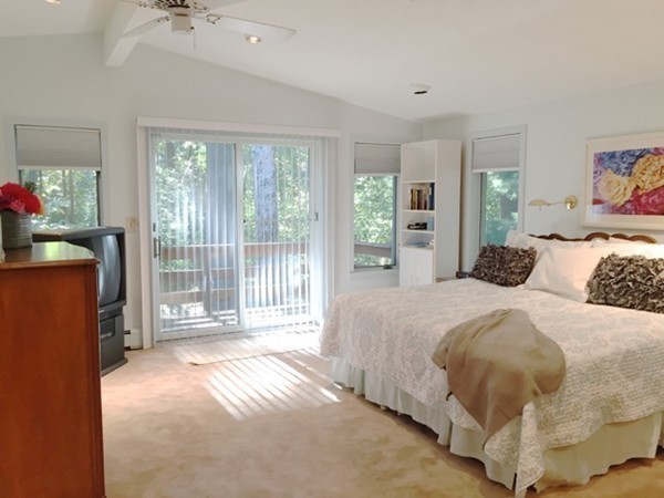 27 Joyce Road Framingham, MA 01701 - Photo 11 of 23 a bed sitting in a bedroom next to a window