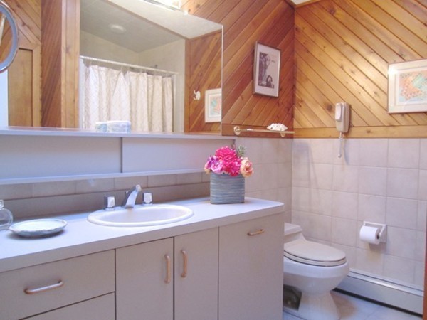 27 Joyce Road Framingham, MA 01701 - Photo 13 of 23 a bathroom with a sink a mirror and a toilet