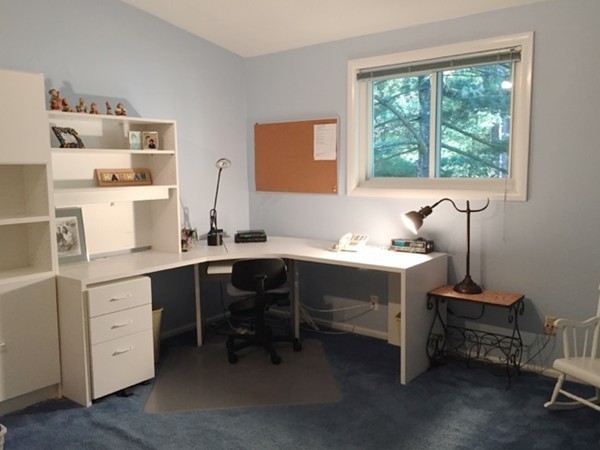 27 Joyce Road Framingham, MA 01701 - Photo 15 of 23 a room with a window and a table chair