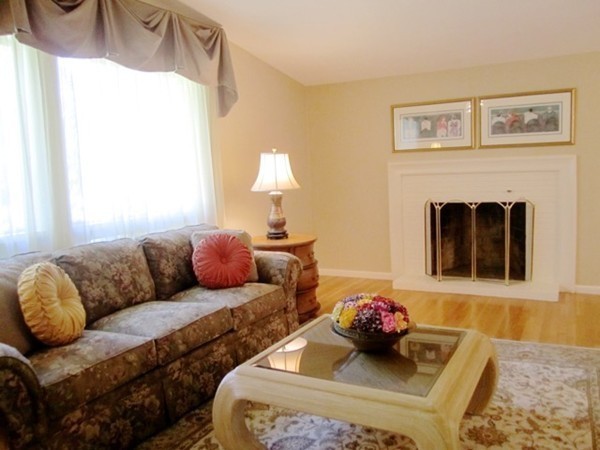 27 Joyce Road Framingham, MA 01701 - Photo 6 of 23 a living room with furniture and a fireplace
