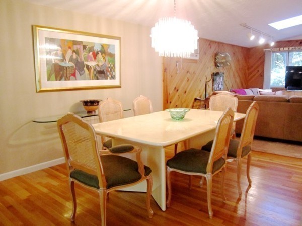 27 Joyce Road Framingham, MA 01701 - Photo 7 of 23 a view of a dining room with furniture and wooden floor
