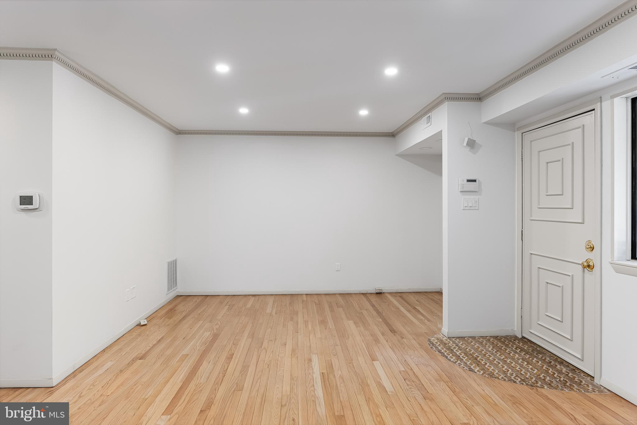 42 Trowbridge Lane, Unit DD Clementon, NJ 08021 - Photo 11 of 28 wooden floor in an empty room with a window
