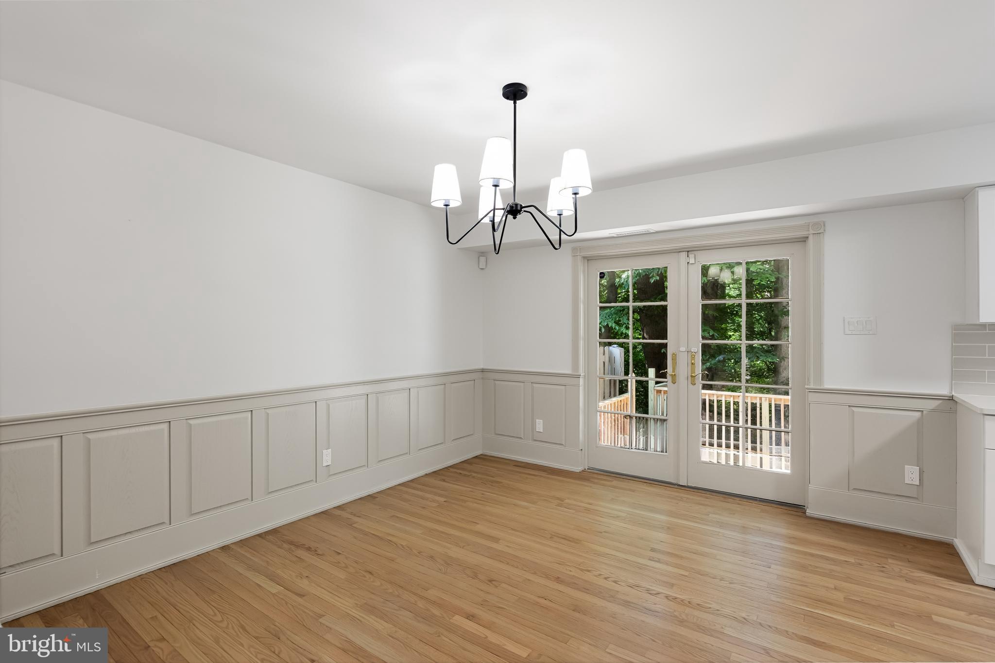 42 Trowbridge Lane, Unit DD Clementon, NJ 08021 - Photo 12 of 28 a view of an empty room with wooden floor and a window