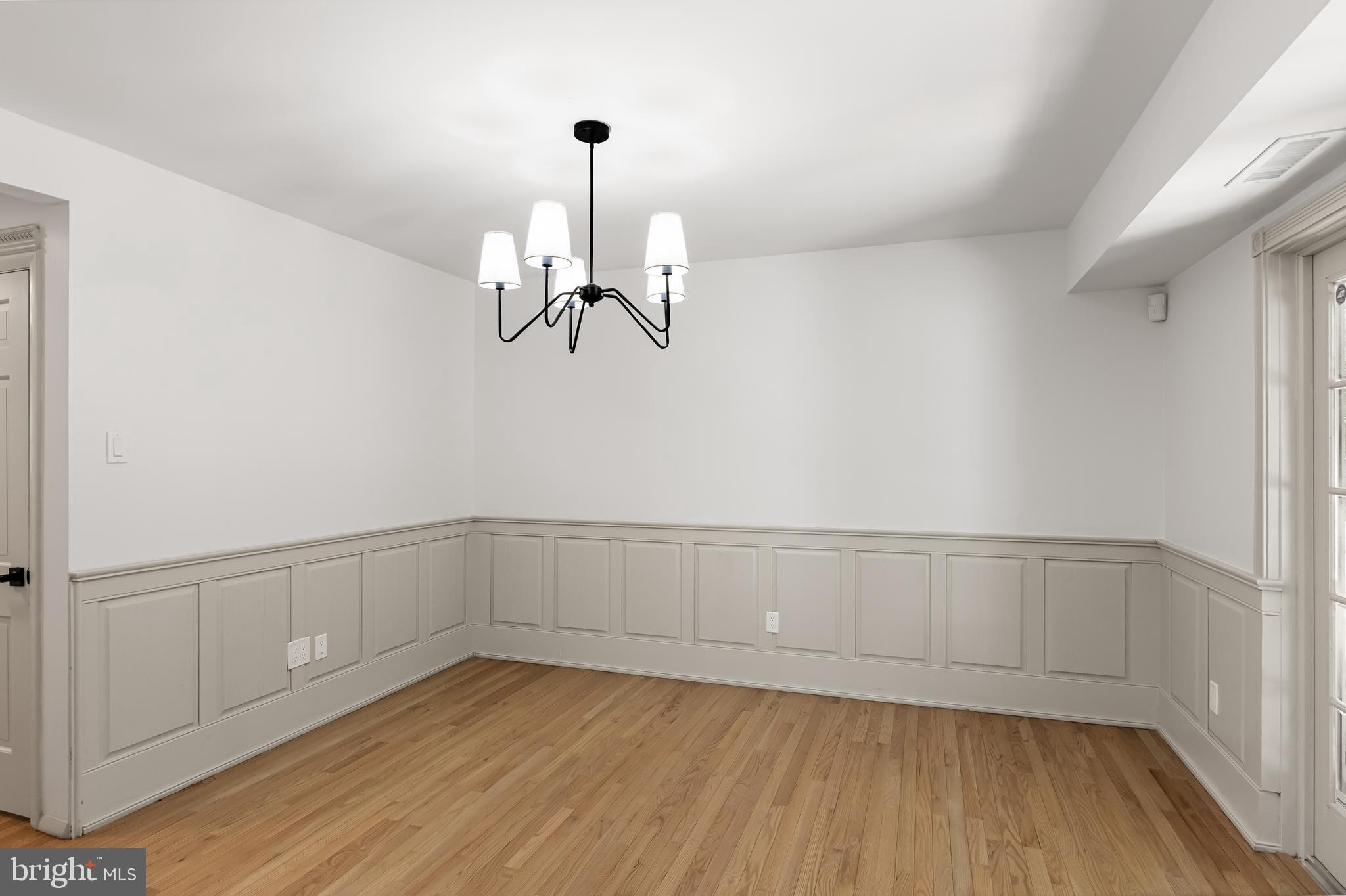 42 Trowbridge Lane, Unit DD Clementon, NJ 08021 - Photo 13 of 28 a view of an empty room with wooden floor