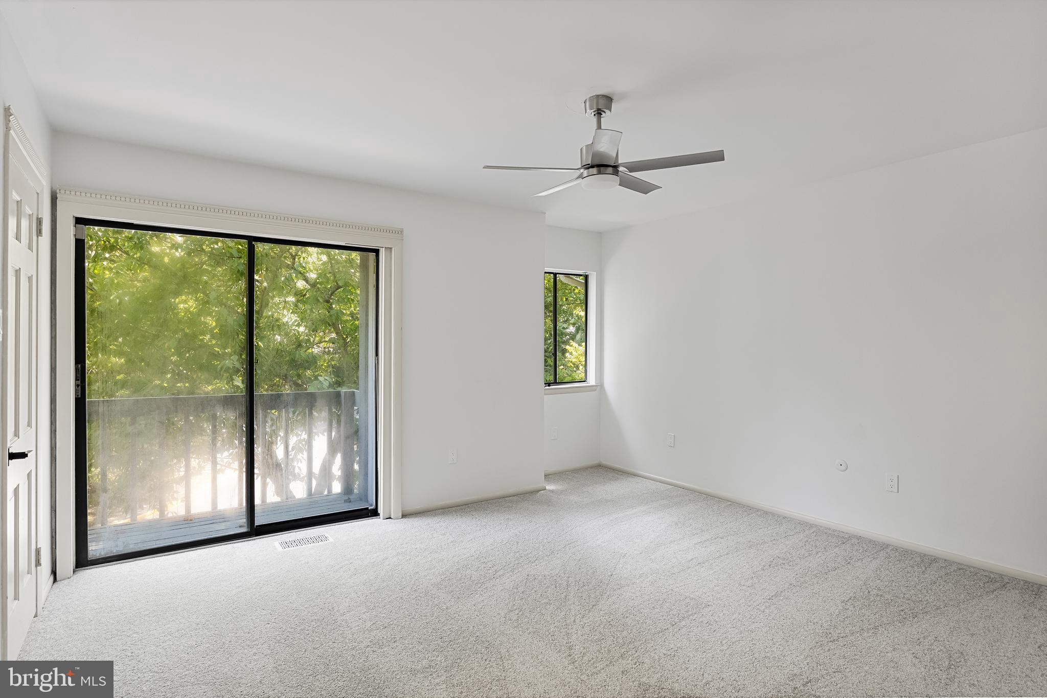 42 Trowbridge Lane, Unit DD Clementon, NJ 08021 - Photo 17 of 28 en empty room with windows and outdoor view