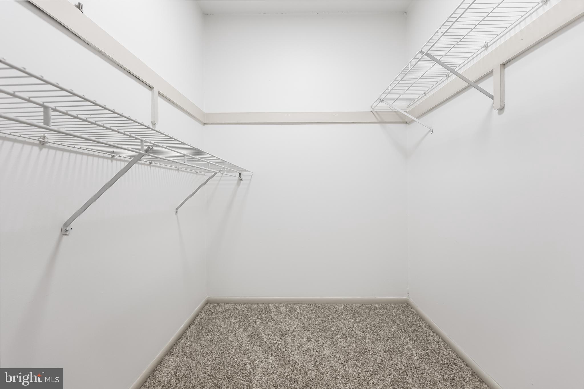 42 Trowbridge Lane, Unit DD Clementon, NJ 08021 - Photo 22 of 28 a view of a room with racks on the wall