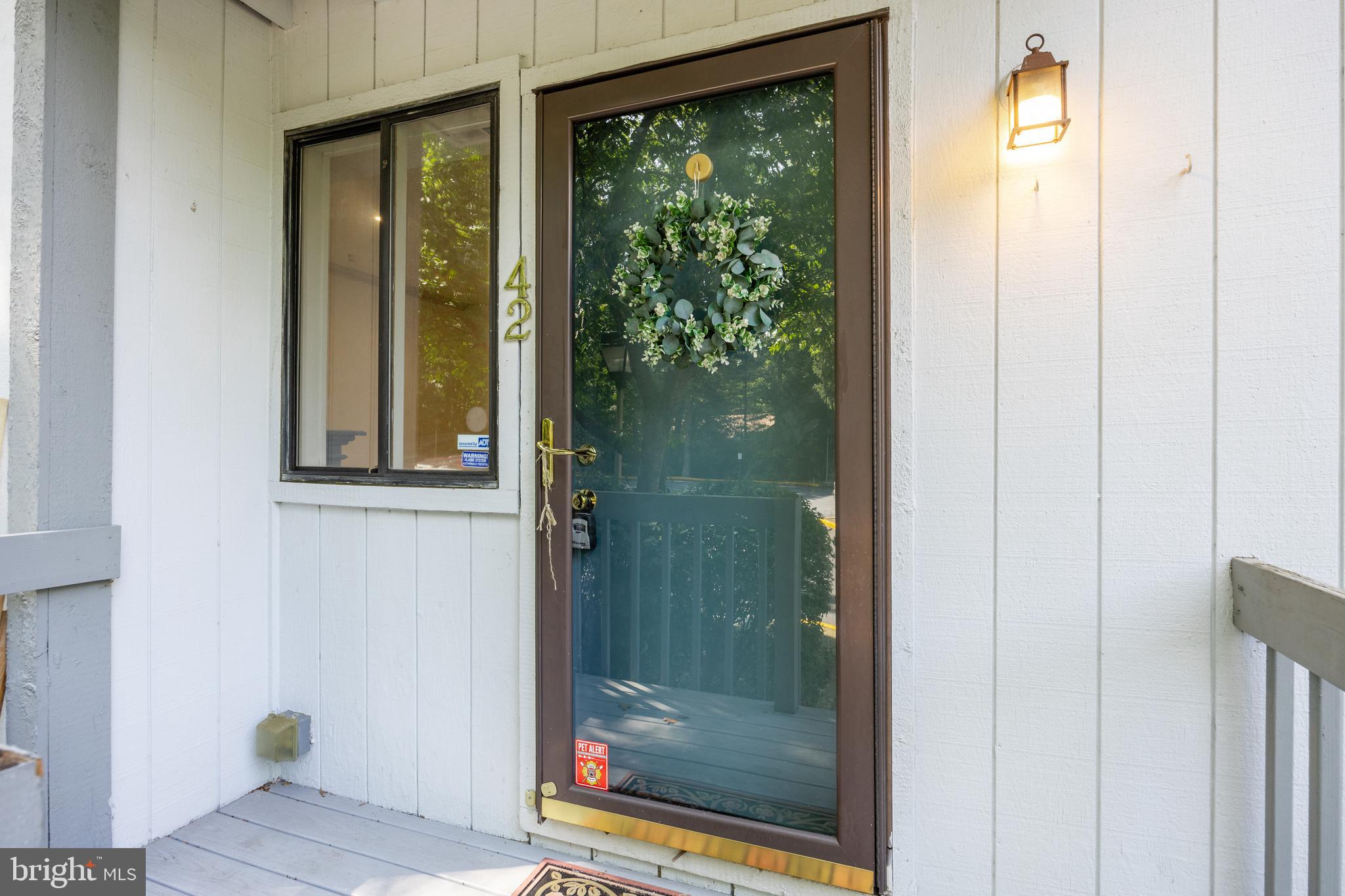 42 Trowbridge Lane, Unit DD Clementon, NJ 08021 - Photo 6 of 28 a bathroom with a glass shower door and a window
