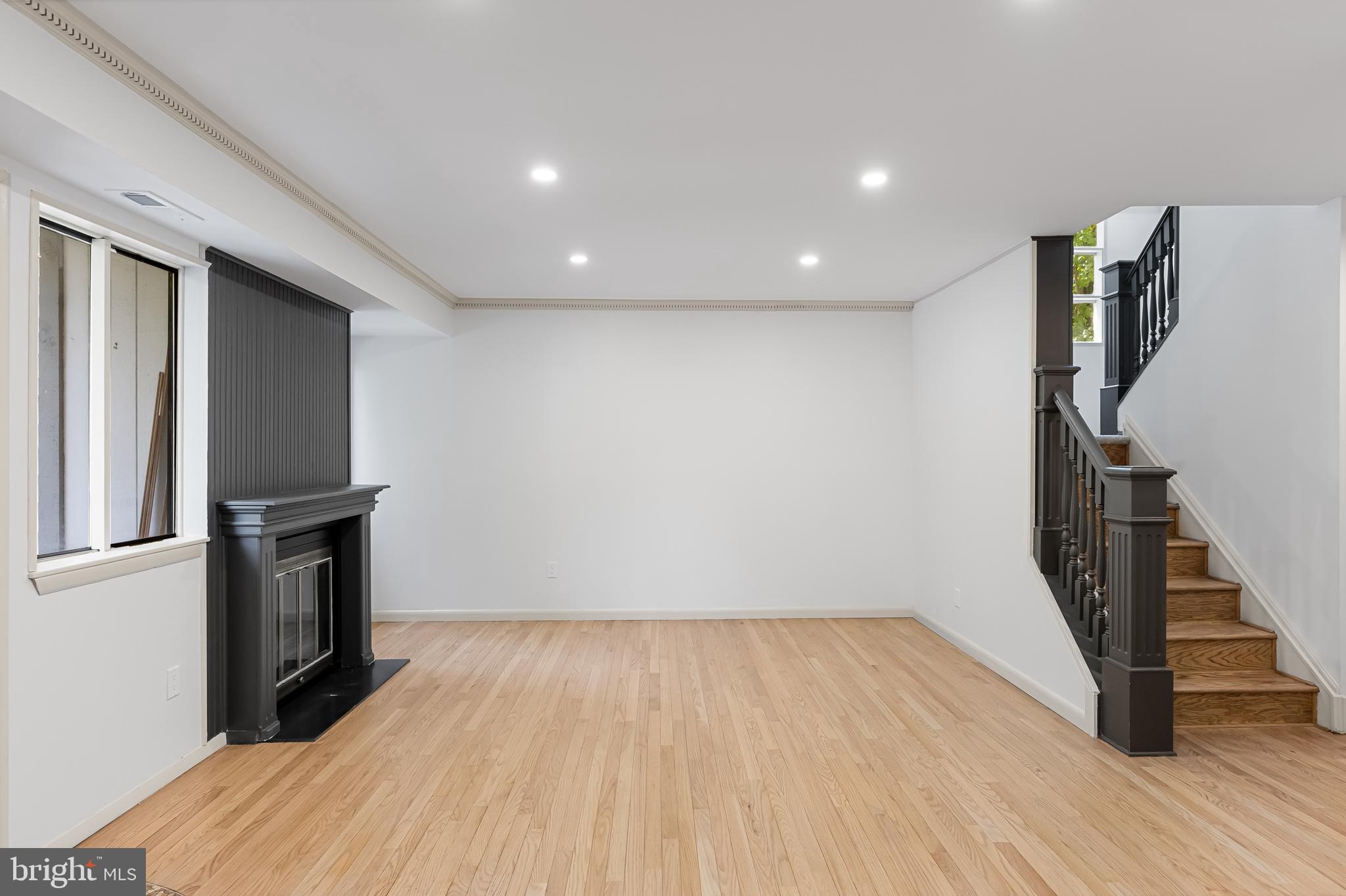 42 Trowbridge Lane, Unit DD Clementon, NJ 08021 - Photo 8 of 28 a view of hallway with stairs and wooden floor