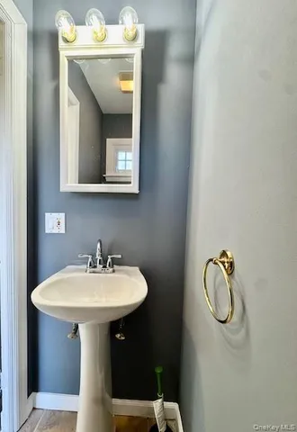 a bathroom with a sink and a toilet