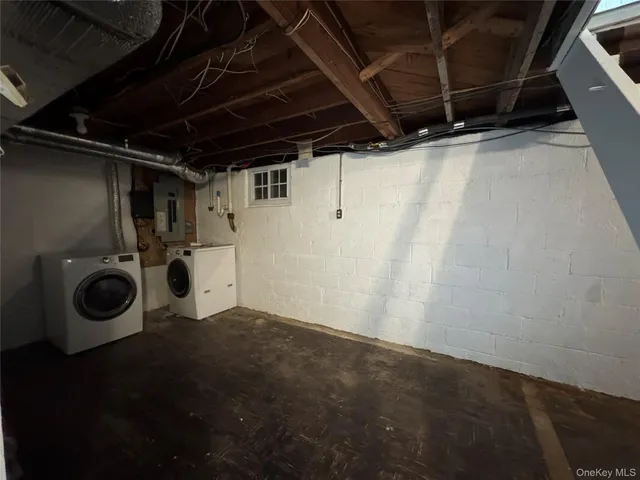 a bathroom with a sink mirror and toilet