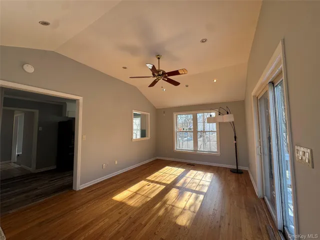 a kitchen with a sink appliances and cabinets