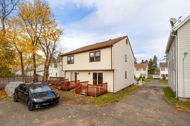 a car parked in front of a house