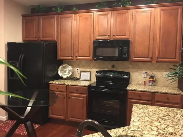 1001 Queens Place Spring Hill, TN 37174 - Photo 6 of 18 Kitchen with lots of cabinets and Pantry