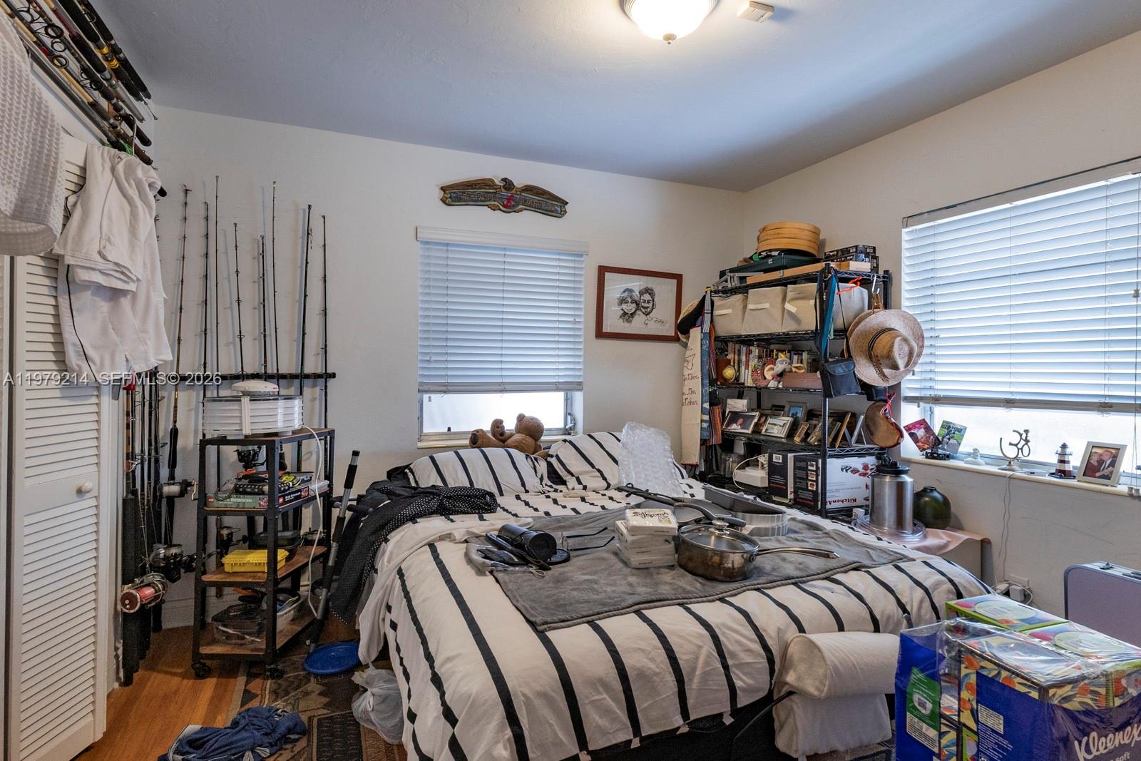 2710 Southwest 28th Court Miami, FL 33133 - Photo 11 of 19 a view of a livingroom with furniture and hardwood