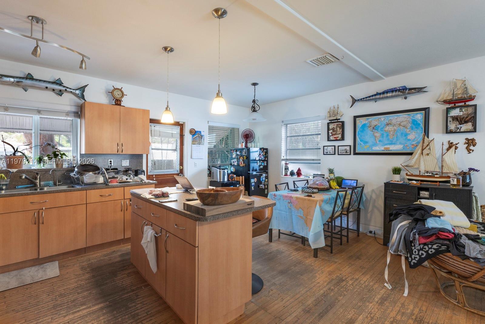 2710 Southwest 28th Court Miami, FL 33133 - Photo 3 of 19 a view of storage utility and kitchen