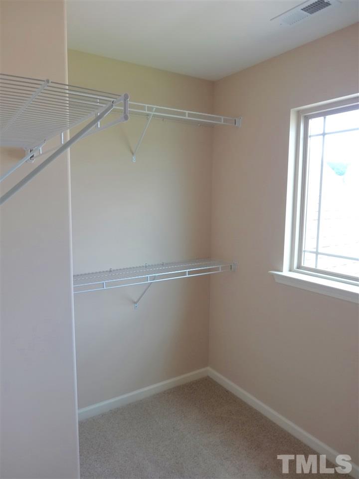 6212 Quitman Trail Raleigh, NC 27610 - Photo 19 of 20 a view of an empty walk in closet