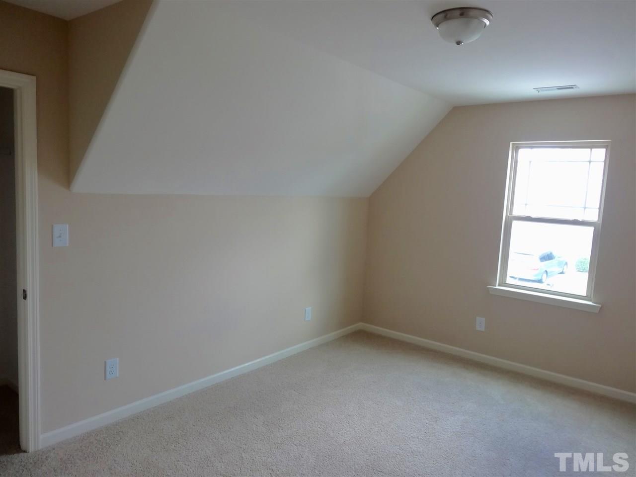 6212 Quitman Trail Raleigh, NC 27610 - Photo 20 of 20 an empty room with a window