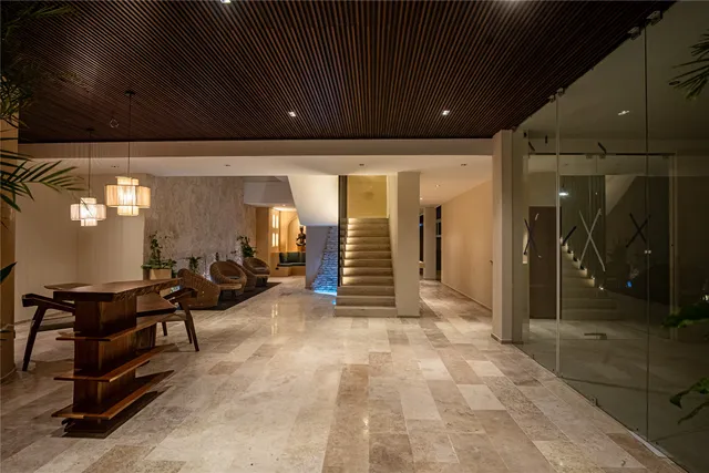 a view of a lobby with chair and tables