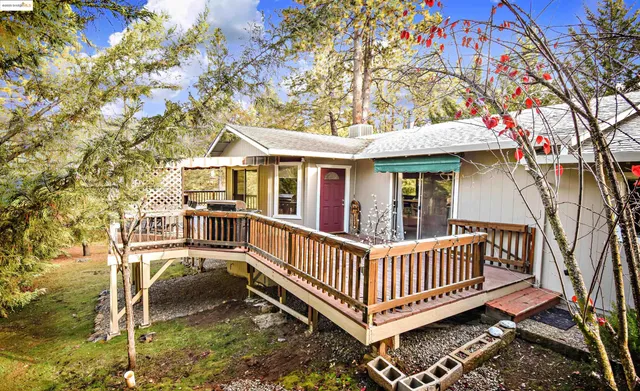 a view of a house with a roof deck