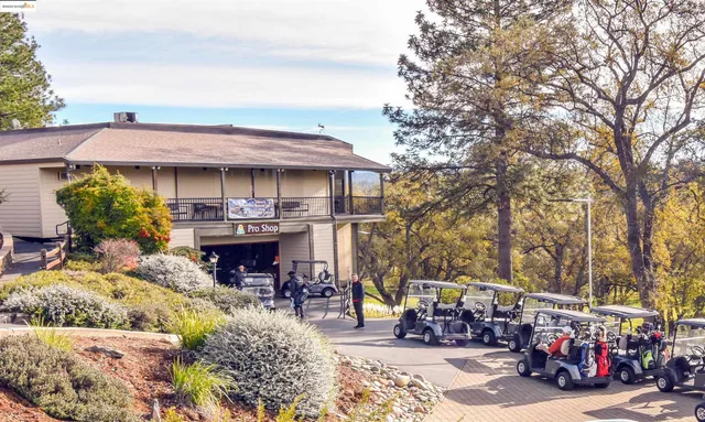a view of a chairs and tables in patio