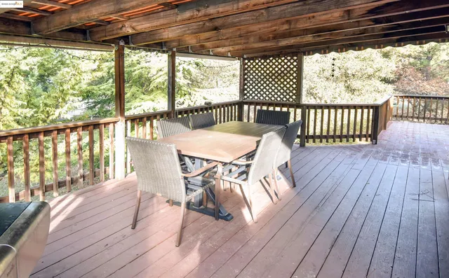 a view of a chairs on the roof deck