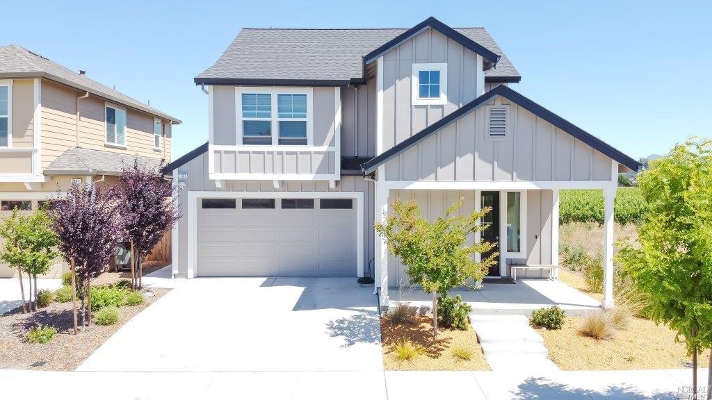2137 Soleil Way Santa Rosa, CA 95403 - Photo 1 of 1 a front view of a house with garden