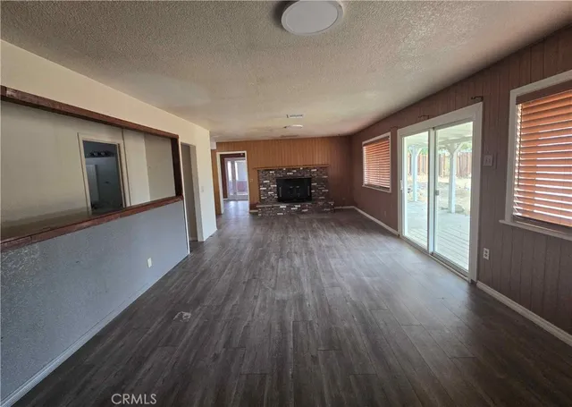 a view of livingroom with furniture hardwood floor and staircase
