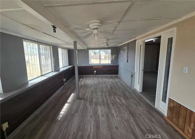 a view of entryway with wooden floor