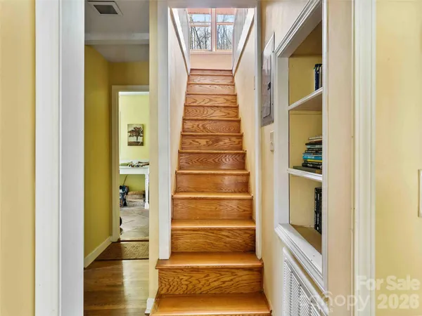 a view of entryway with a door and wooden floor